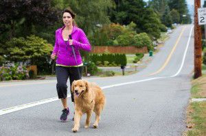 woman running with her dog