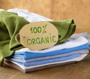 stack of multicolored clothing with organic label