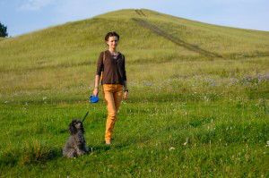 Girl walking with a dog