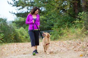 woman walking with dog