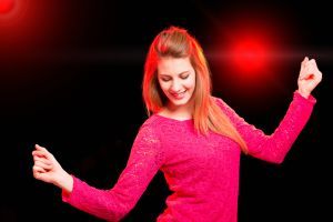 Woman dancing in a disco