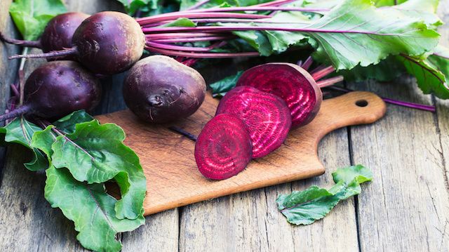 Fresh beet on wooden background