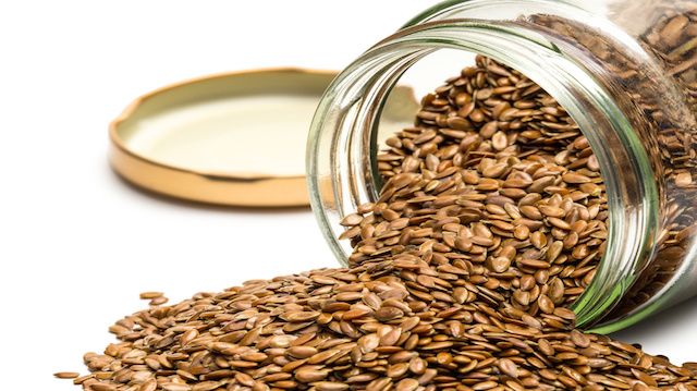 Linseed in an overturned glass jar