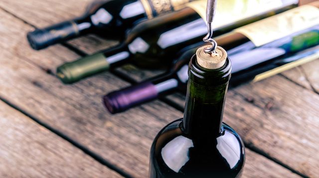 Wine bottle on a wooden table