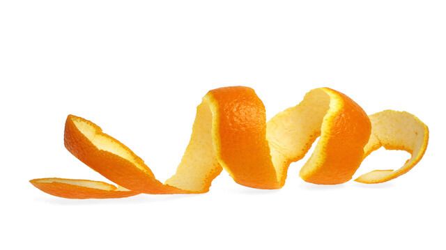 Orange peel against white background