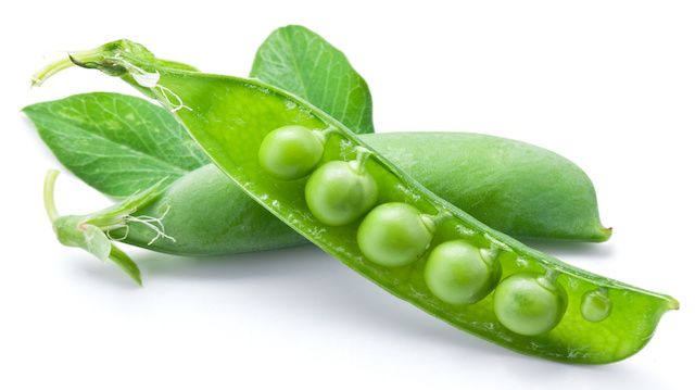 Fresh peas are contained within a pod.