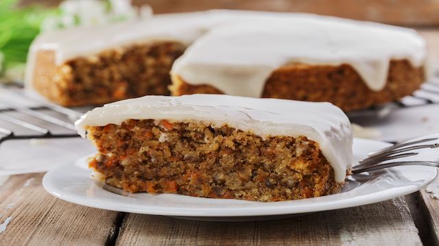 carrot cake with nuts and cream