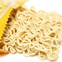 Raw asian ramen instant noodle uncooked isolated on white background