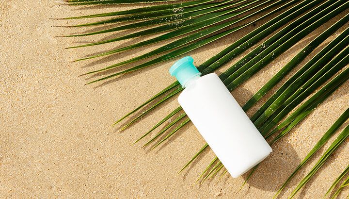 Use an empty sunscreen bottle to keep your valuables safe